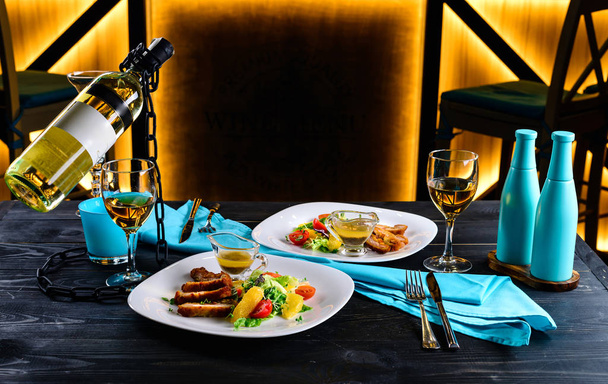 appetizer and wine for a romantic evening in a restaurant - Photo, Image