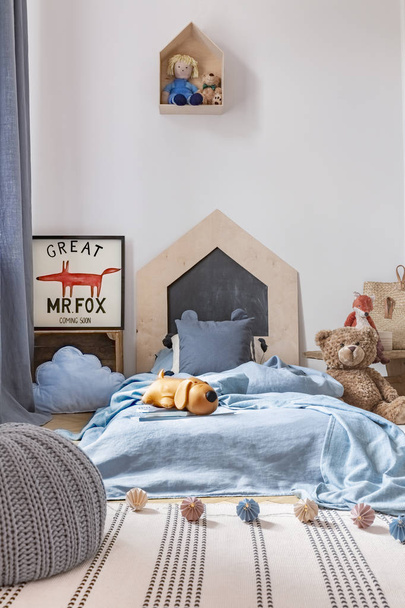 Real photo of a boy room interior with toys, bed and rug - Foto, afbeelding