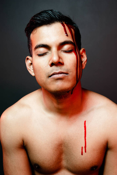 young man with blood on his face - Foto, Imagem