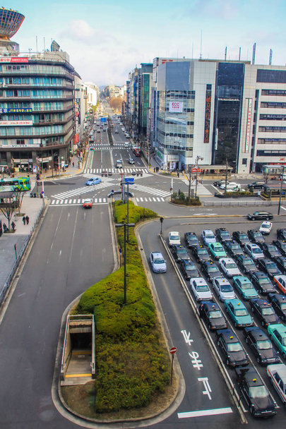 2013.01.04, Kyoto, Japan. Station view of Kyoto Hotel and the car parking. Cityscape of Kyoto. - Фото, изображение
