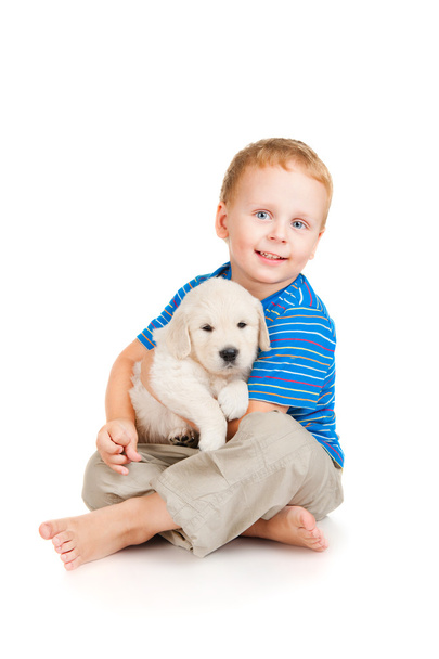 Little boy with a puppy - Fotó, kép