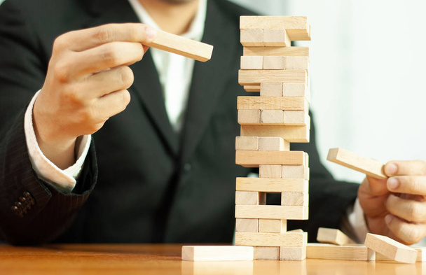 Jenga business game, business fulfillment Building a business base Failed business base Stable and unstable business base. - Photo, image