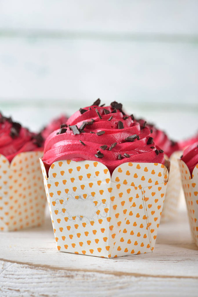 Chocolate cupcakes with pink icing - Photo, image