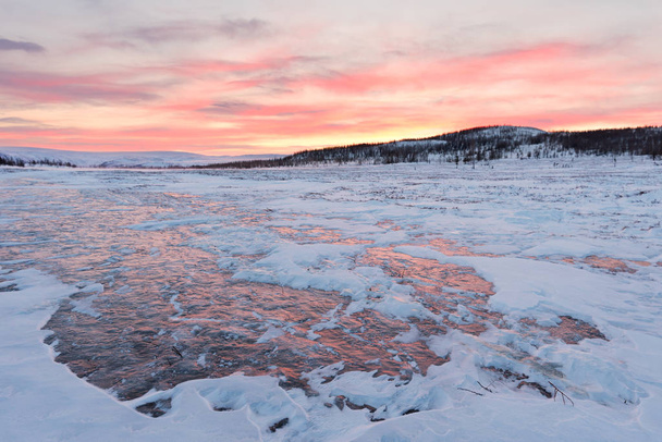 Sunset in the Arctic tundra, Yamal peninsula. March. - Фото, зображення