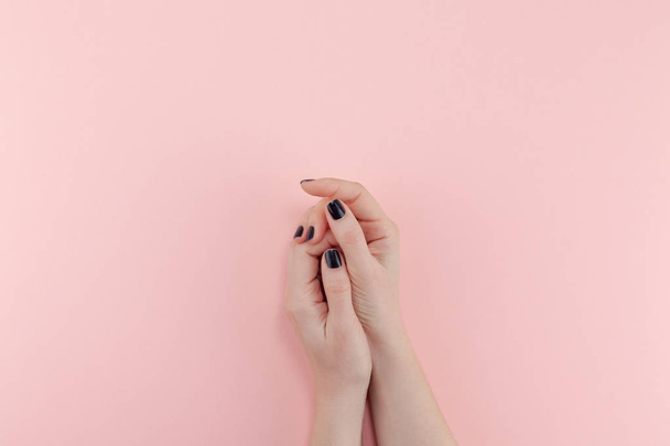 Woman's hands with black manicure - Foto, Imagem