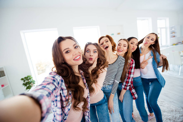 Close up photo beautiful she her ladies big family roommates having fun best buddies make take selfies funny facial expression excited amazed bright white room girls day night indoors - Foto, imagen