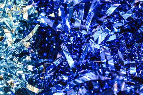 Confetti. Festive ornament, a decor from new years rain. Birthday. Background or texture. Bright blue colors. Holidays. - Fotoğraf, Görsel