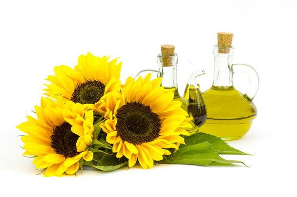 sunflower oil and sunflowers - Photo, Image