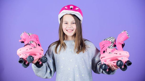 Happy child with roller skates. Freestyle. Sport success. Little girl. Fitness health and energy. race workout of teen girl. Roller skating. Childhood activity. happy trendy girl. happy to rolling - Φωτογραφία, εικόνα