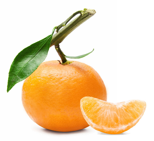 Fresh mandarin on a branch with green leaf on an isolated white background - Foto, Imagen