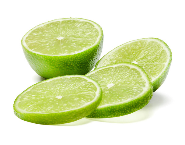 Lime slices on white isolated background - Fotoğraf, Görsel