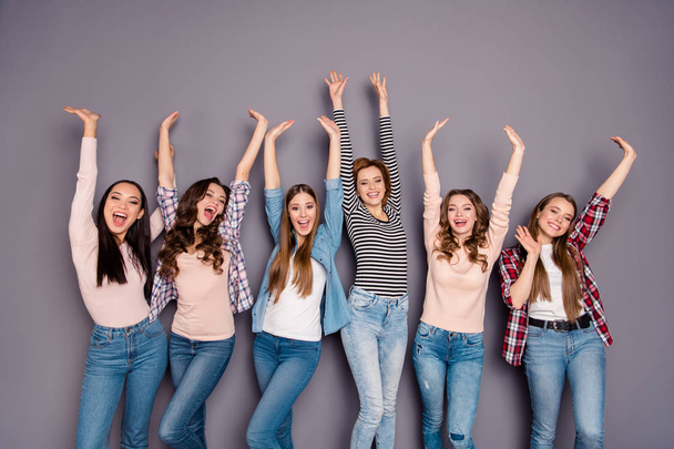 Close up photo beautiful yelling she her six ladies skinny roommates hands arms raised up hanging out wearing casual jeans denim checkered striped clothes outfit isolated grey background - Photo, Image