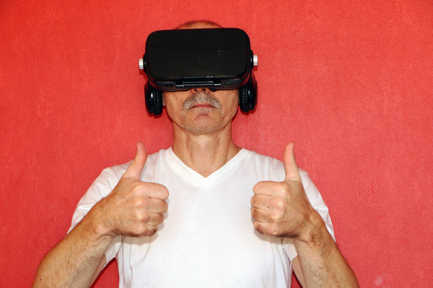 The man in a virtual reality glasses gesturing  - Фото, зображення
