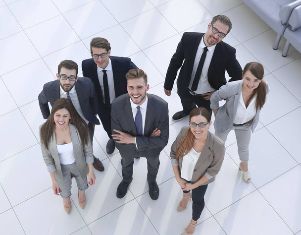 top view.a group of business people standing in a new office - Fotografie, Obrázek