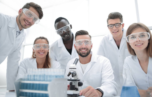 Group of young clinicians experimentation in research laboratory - Photo, Image