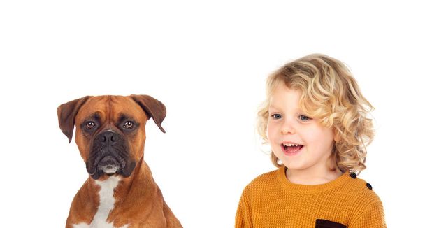 Funny blond child and his dog isolated on a white background - Φωτογραφία, εικόνα