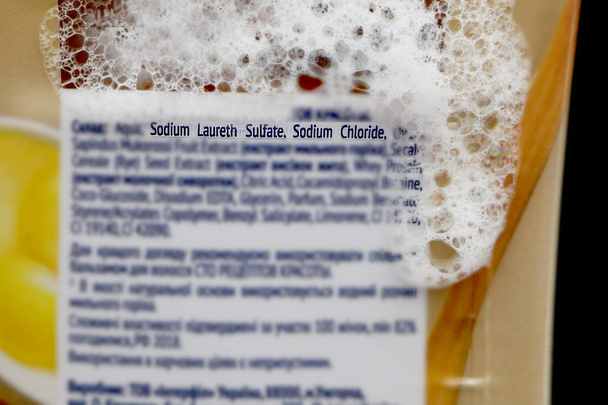 Sodium laureth sulfate (SLES). Composition of shampoo with sulfate on woman's hair - Photo, Image