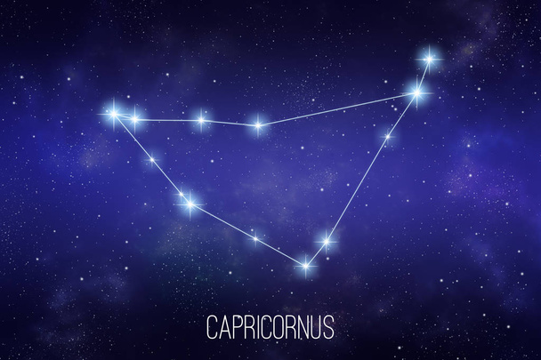 Capricornus zodiac constellation on a starry space background with lettering - 写真・画像
