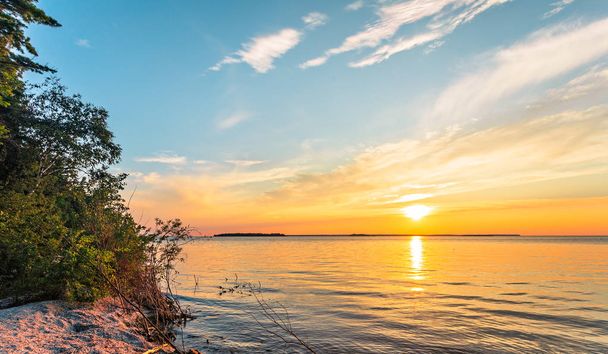 Sunset on Lake Michigan at Peninsula State Park - Фото, изображение
