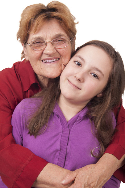 Grandmother and granddaughter hugging - Foto, afbeelding