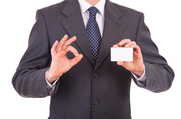 Hombre de negocios mostrando tarjeta en blanco
. - Foto, imagen