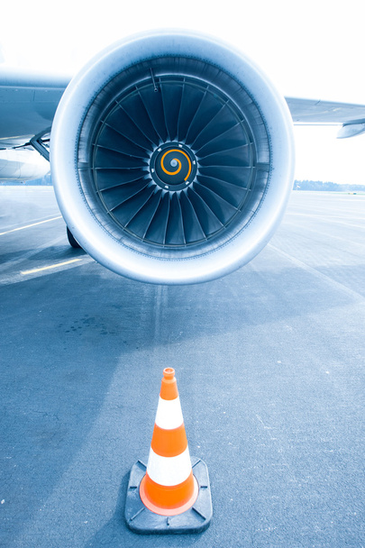 Jet engine with traffic cone in front - Photo, Image