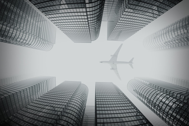 Business towers with a airplane silhouette - Foto, immagini