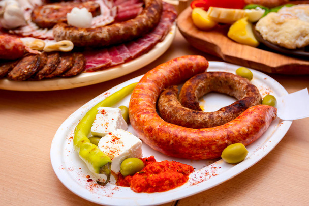Traditional sausages are arranged for review at food contest - Photo, Image