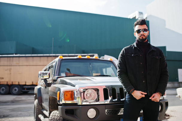 Fashion rich beard Arab man wear on black jeans jacket and sungl - Fotoğraf, Görsel
