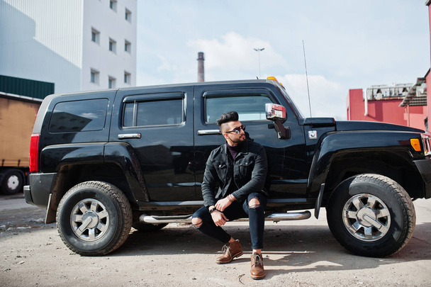 Fashion rich beard Arab man wear on black jeans jacket and sungl - Фото, зображення