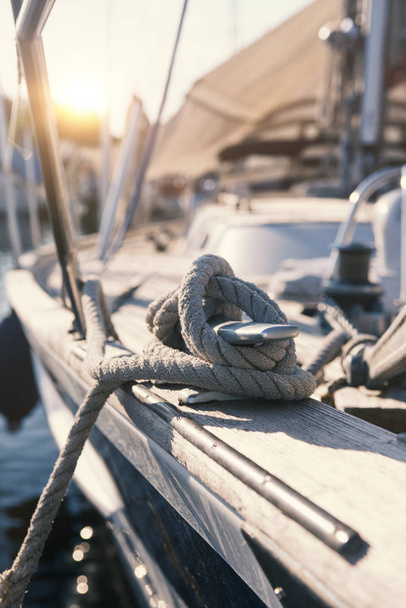 Mooring rope and bollard at the harbor - Фото, изображение