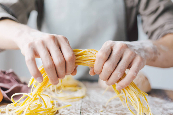 Chef making fresh italian pasta - Foto, imagen