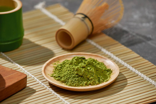 Organic Green Matcha Tea on wooden table, copyspace - 写真・画像