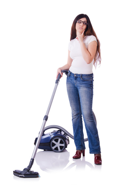 Young woman with vacuum cleaner on white - Photo, Image