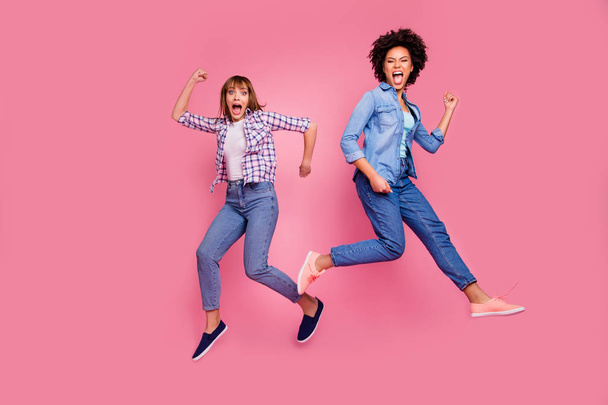Full length body size view of two person nice cool careless carefree attractive charming cheerful funny girls having fun rejoicing weekend isolated over pink pastel background - Fotoğraf, Görsel