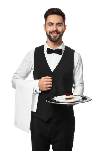 Camarero guapo con sabroso postre sobre fondo blanco
 - Foto, imagen