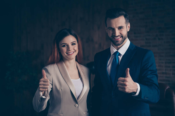 Close up photo she her business lady he him his guy glad achievement people self-confident couple best cool show thumbs up approving candidate assistant stand office wearing formal wear - Photo, image