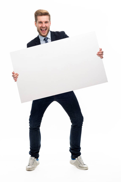 Business man holding white board - Zdjęcie, obraz