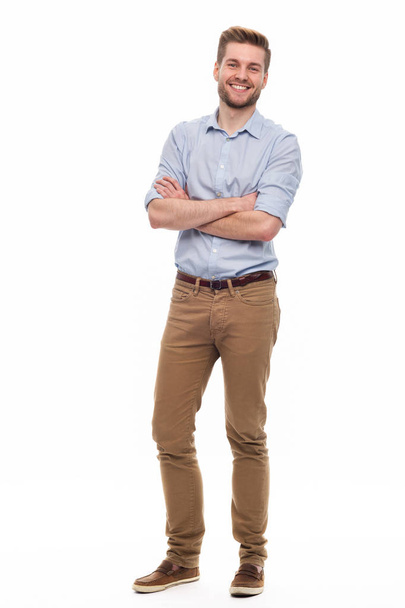 Full length portrait of young man standing on white background - Fotografie, Obrázek