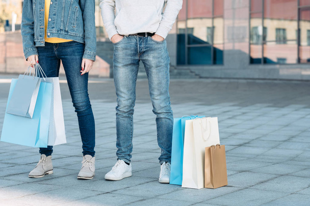 casual shopping couple sale consumerism legs jeans - Foto, Imagen