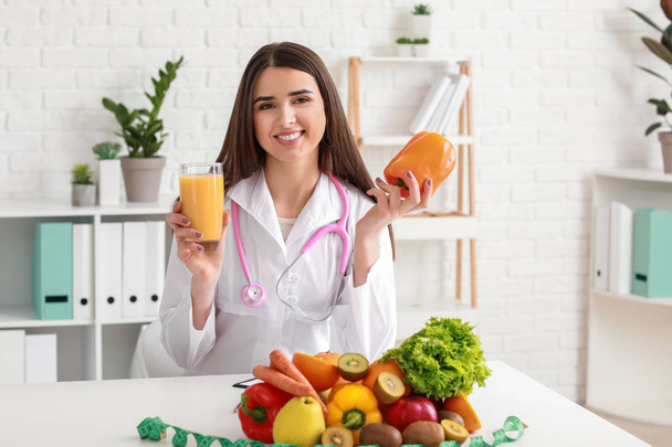 Portrait of female nutritionist in her office - Photo, Image