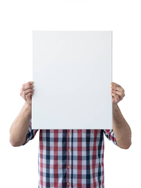 Holding canvas mockup. Photo Mockup. The man hold canvas. For canvas design. Frame size 16x20 (40x50cm). - 写真・画像