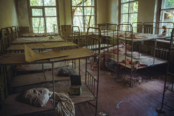 Chornobyl exclusion zone. Radioactive zone in Pripyat city - abandoned ghost town. Chernobyl history of catastrophe. Lost place in Ukraine, SSSR - Fotografie, Obrázek