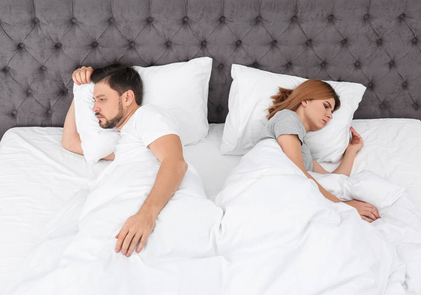 Couple with relationship problems in bed at home - Foto, Bild