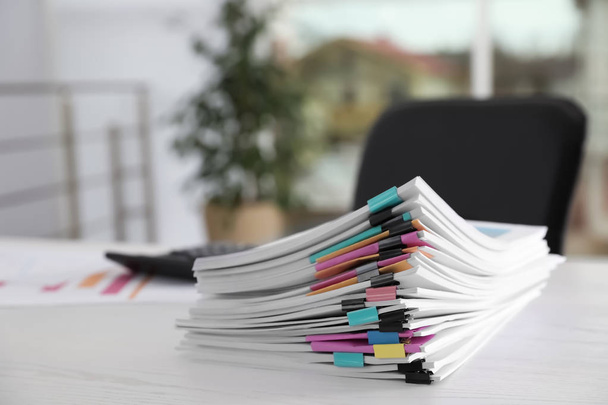 Stack of documents with paper clips on office table. Space for text - Foto, imagen