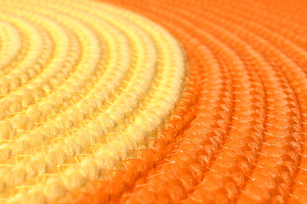 Orange and yellow wicker mat texture as background, closeup - Фото, изображение
