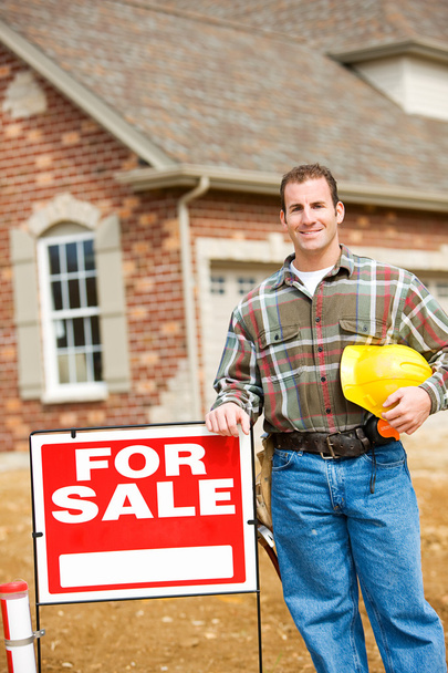 Construction: Builder Stands By Sale Sign - Photo, Image