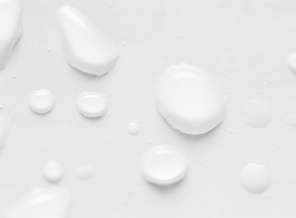drops of water on a white background - 写真・画像