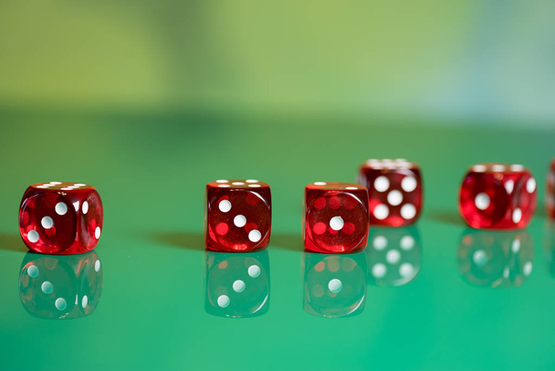 Colorful game dice with dots on blurred background - Photo, Image