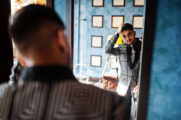 Young indian handsome business man at evening suit on restaurant - Fotografie, Obrázek
